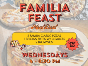 The image includes text which describes a "Familia Feast Meal Deal' special. The Familia Feast includes: 1 order of Belgian Frites with 3 Sauces Any 2 Classic Familia Mosaic Pizzas 2 Brownie Sundaes with Ice Cream and Caramel Sauce. The text explains it is available every Wednesday from 4 - 8:30 pm for dine-in carry out and delivery.